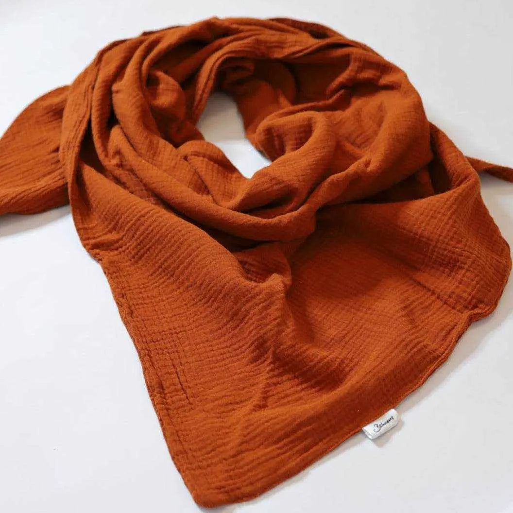 Musselinschal Erwachsene"terracotta" 240x100cmUnsere Musselinschals bringen Farbe in deinen Kleiderschrank und erhöhen den Kuschelfaktor! Sie bestehen zu 100% aus Baumwolle.Die Masse des Dreieckstuch ist in ca. Musselinschal ErwachseneBöhnens